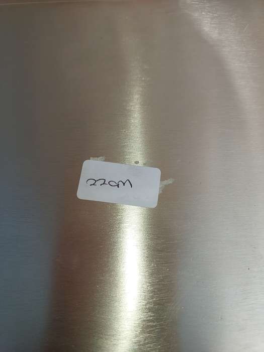 A SQUARE STAINLESS STEEL SERVING TRAY