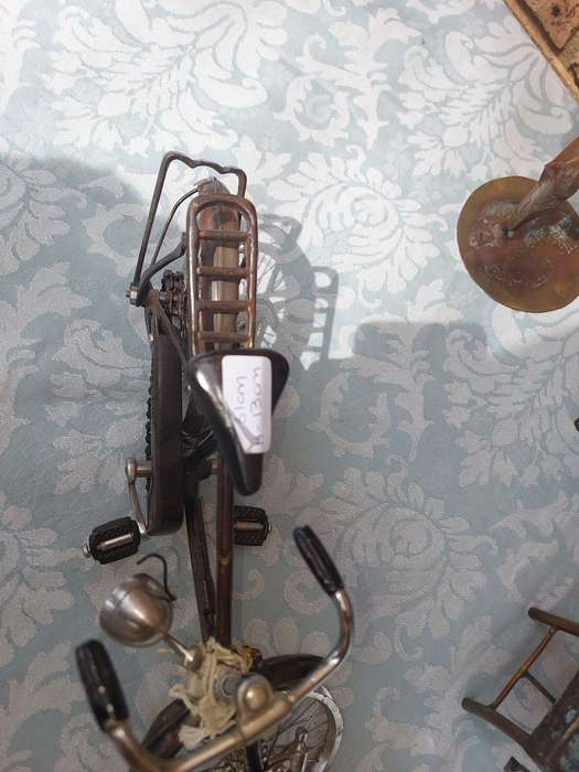 A COLLECTION OF COPPER FIGURINE ART SCULPTURES A PIANIST ,A PIANO WITH A SAXOPHONIST AND A BICYCLE