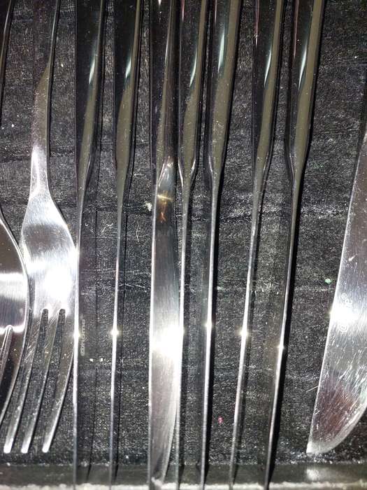 AN 18 PIECE @HOME STAINLESS STEEL CUTLERY SET SOLD AS IS