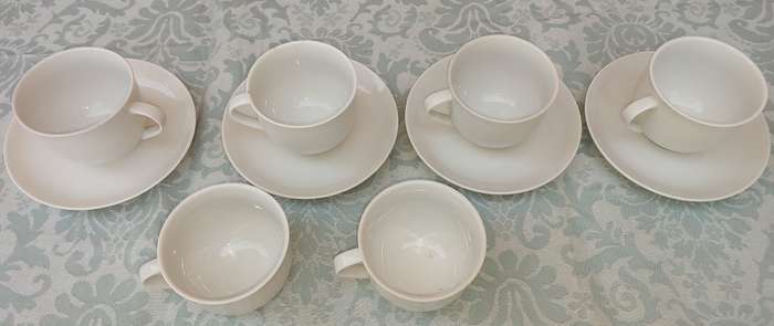 A vintage collection of 6 cups and 4 saucers white porcelain Royal Avon