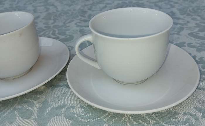 A vintage collection of 6 cups and 4 saucers white porcelain Royal Avon