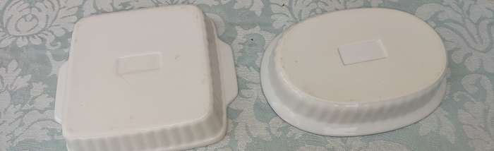 A hand-painted floral blue and white porcelain oven-proof DISHES