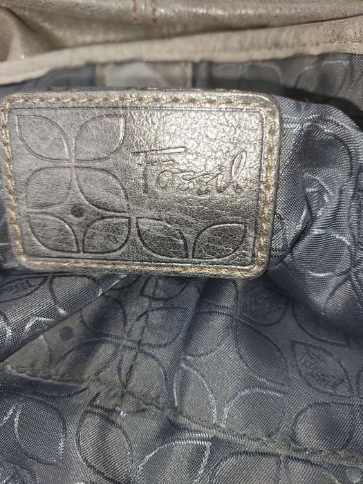 A USED JOBLOT HANDBAGS AND PURSES SOLD AS IS