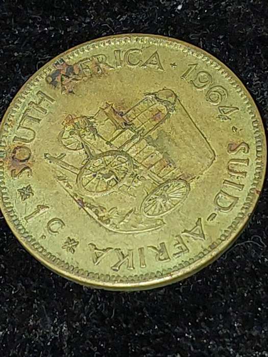 A COLLECTION OF VINTAGE AND ANTIQUE SOUTH AFRICAN COINS SOLD AS IS