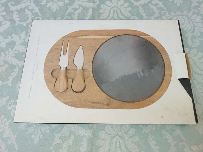 AN ART DECOR SLATE CHEESE BOARD SOLD AS IS