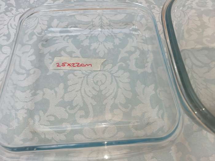 A COLLECTION OF OVEN PROOF CASEROLES SOLD AS IS