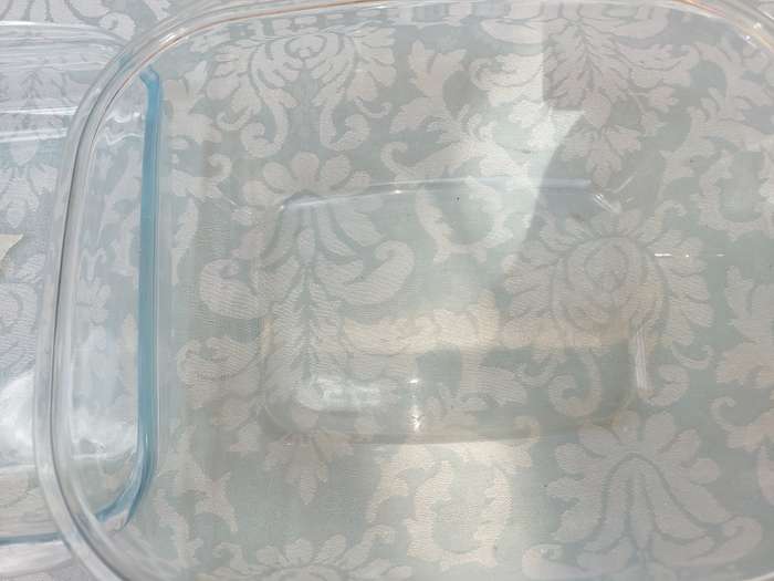 A COLLECTION OF OVEN PROOF CASEROLES SOLD AS IS