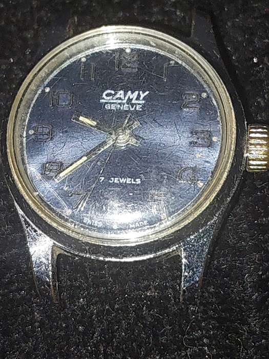 A VINTAGE CAMY 17 JEWELS SWISS MADE SERIAL NUMBER 1201 WORKING, WITH OUT A STRAP AND HAS SOME SCRATC