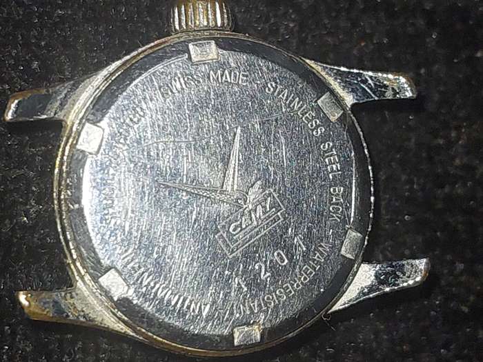 A VINTAGE CAMY 17 JEWELS SWISS MADE SERIAL NUMBER 1201 WORKING, WITH OUT A STRAP AND HAS SOME SCRATC