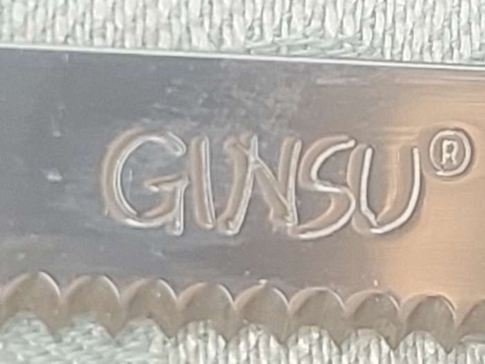 A VINTAGE SET OF 4 JAPANESE GINSU STEAK KNIVES SOLD AS IS