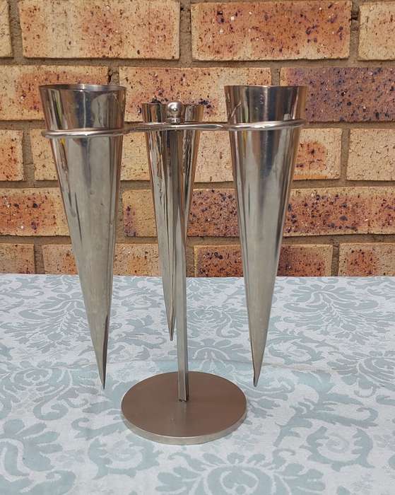 A STAINLESS STEEL ICE CREAM CONE HOLDER SOLD AS IS R200