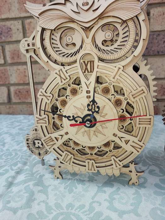 A COLLECTION OF WOODEN PROJECT WATCH OWLS AND A TRAIN ENGINE SOLD AS IS NOT TESTED