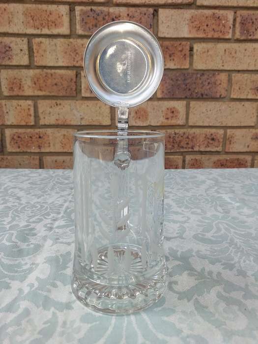 A GERMAN BEER STEIN IN MINT CONDITION SOLD AS IS R750