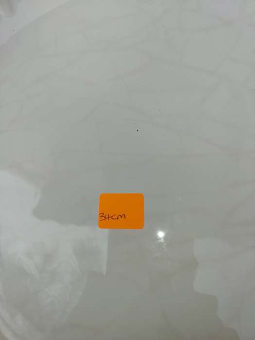 AN ART DECOR WHITE PORCELAIN ROUND SRVING PLATTER SOLD AS IS