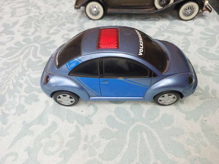 A VINTAGE COLLECTION MODEL CARS SOLD AS IS