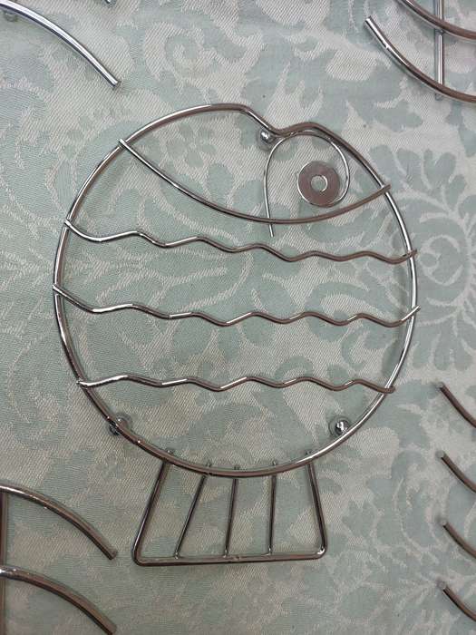 A COLLECTION OF HOT POT TABLE GRIDS STAINLESS STEEL SOLD AS IS