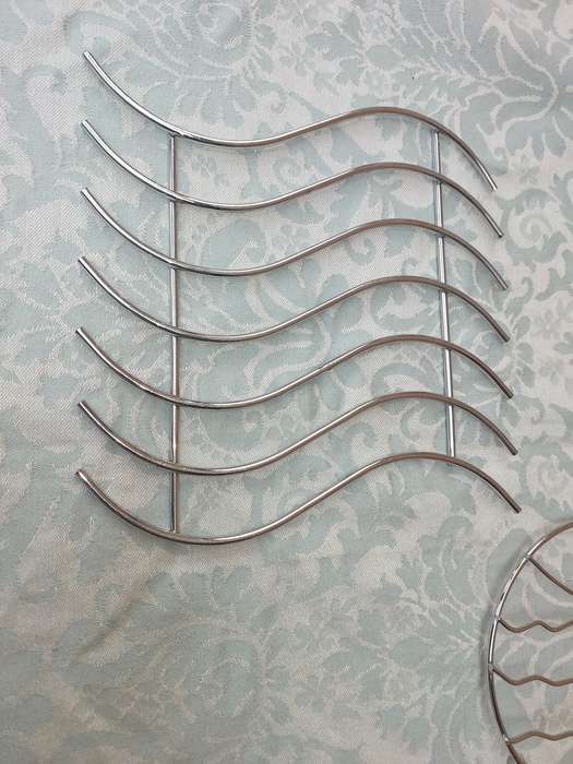 A COLLECTION OF HOT POT TABLE GRIDS STAINLESS STEEL SOLD AS IS