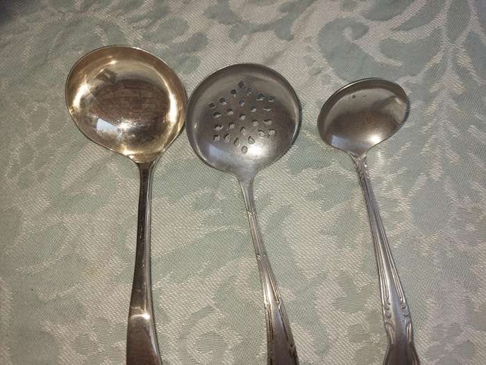 A COLLECTION OF 3 SUGAR OR SAUCE LADLES SOLD AS IS