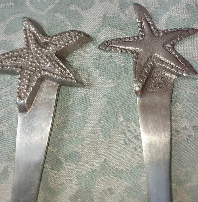 AN ART DECOR PEWTER SET SALAD LADELS SOLD AS IS