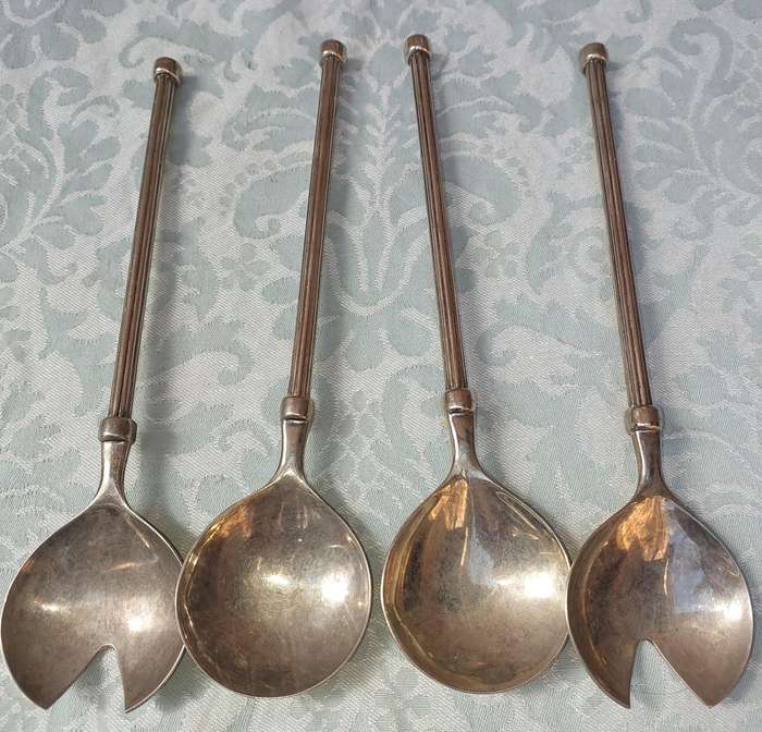 TWO VINTAGE SETS STAINLESS STEEL SALAD LADELS SOLD AS IS