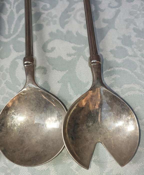 TWO VINTAGE SETS STAINLESS STEEL SALAD LADELS SOLD AS IS