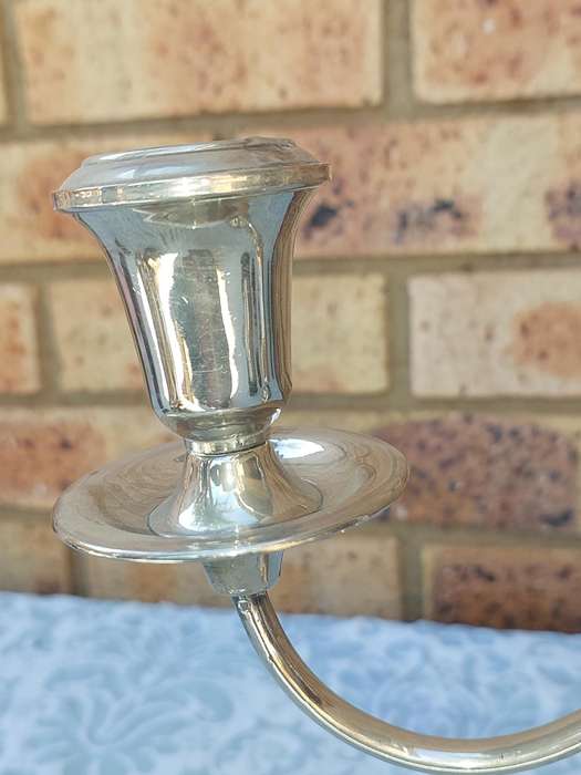 A SILVER PLATED CANDLEBRA NEEDS SOME TLC SOLD AS IS