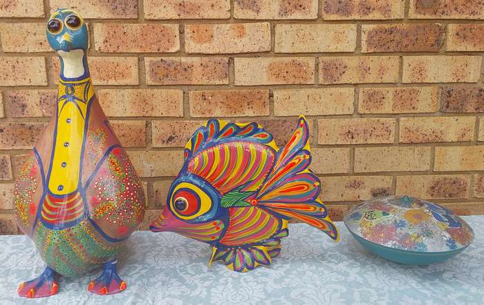 A COLLECTION OF RARE FOLK ART STATUES HIGHLY COLLECTABLE SOLD AS IS