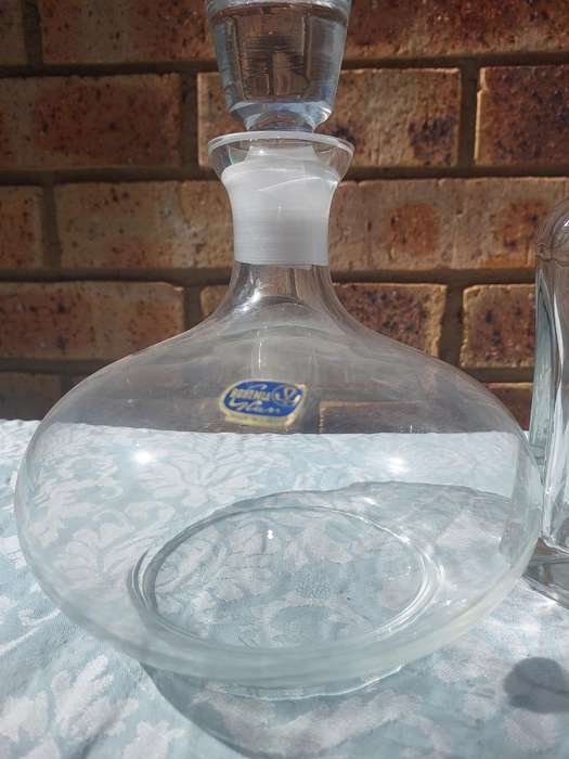 A VINTAGE COLLECTION GLASS DECANTERS FOR THE GENTLEMENS BAR SOLD AS IS