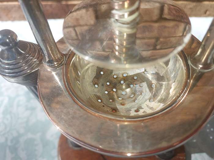 A VINTAGE FRENCH DUCK AND LOBSTER PRESS SILVER PLATED WITH WOODEN BASE SOLD AS IS
