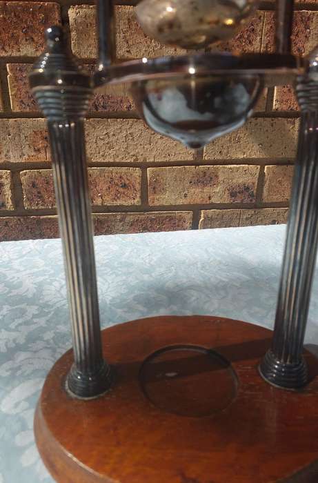 A VINTAGE FRENCH DUCK AND LOBSTER PRESS SILVER PLATED WITH WOODEN BASE SOLD AS IS