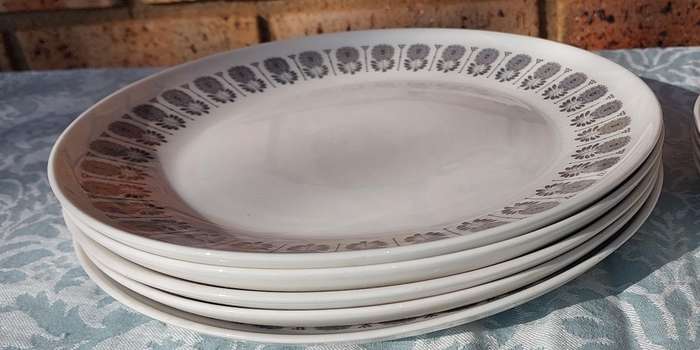 A VINTAGE PORCELAIN FINE CONSTANTIA DINNER PLATE SET SABS STAMPED SOLD AS IS