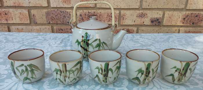 A vintage Yixing tea pot set sold as is