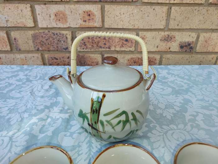 A vintage Yixing tea pot set sold as is