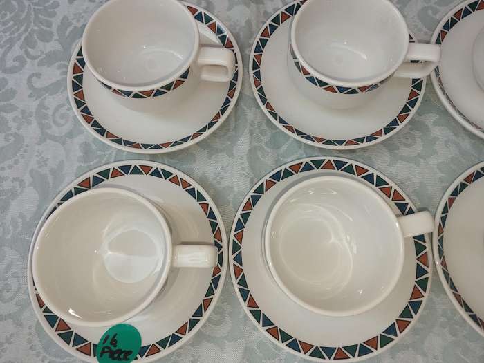 A SET OF CUPS AND SAUCERS BY ROYAL PORCELAIN KINGDOM OF  THAILAND SERIES 02 SOLD AS IS