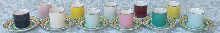 A 17 PIECE DEMATASSE EXPRESSO PORCELAIN CUP AND SAUCER COLECTION SOLD AS IS
