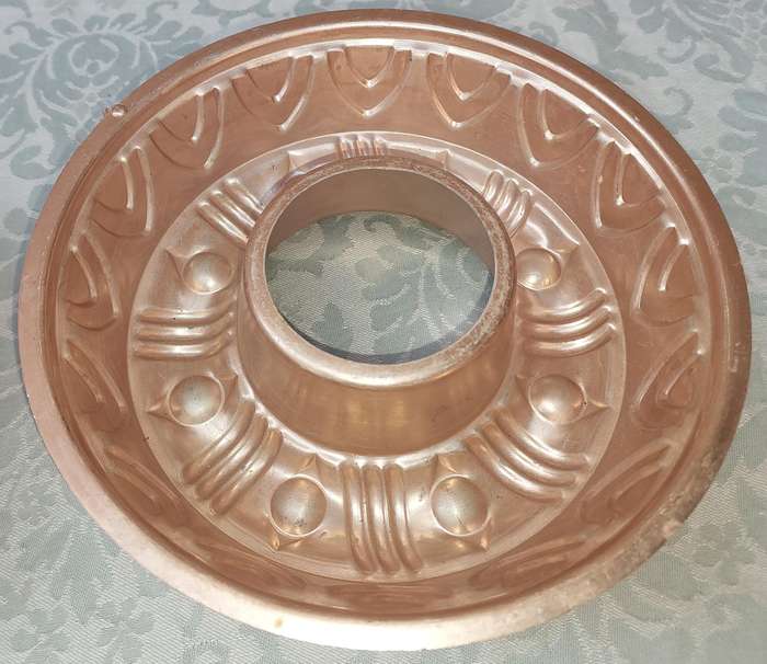 A COLLECTION OIF COPPER BAKING DISHES SOLD AS IS