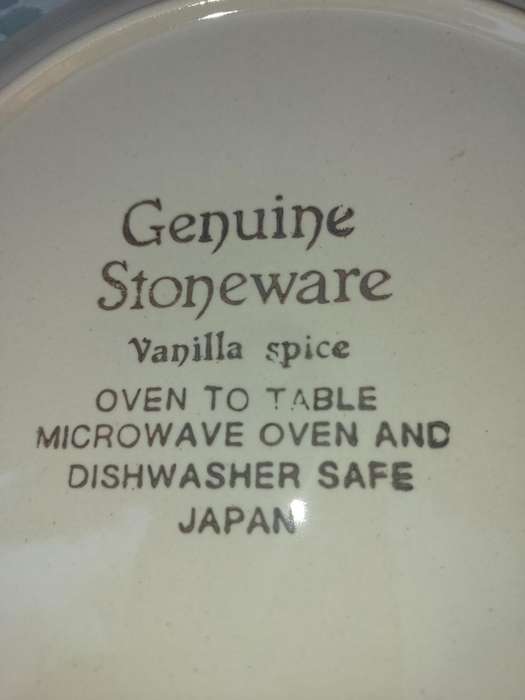 TWO GENUINE STONEWARE VANILLA SPICE PLATES SOLD AS IS