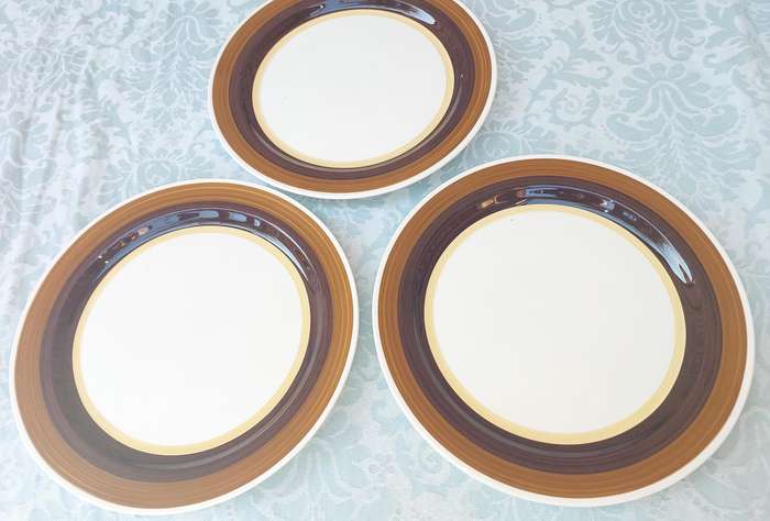 THREE NORITAKI CRAFTS STONE MAHOGANY PLATES SOLD AS IS