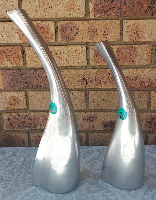 TWO ART DECOR PEWTHAL VASES SOLD AS IS
