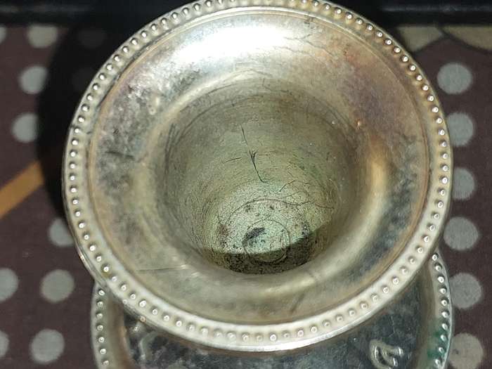 A PAIR OF JUDAICA CANDLE HOLER SILVER PLATED SOLD AS IS