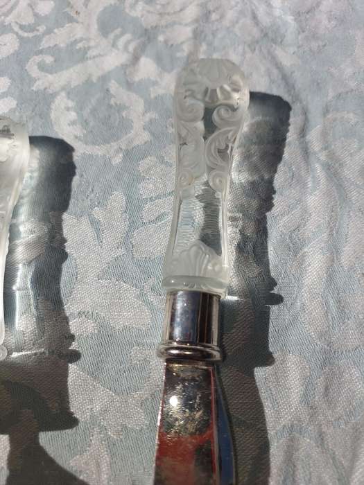 AN ART DECOR CAKE CUTTING SET CUTLERY SOLD AS IS