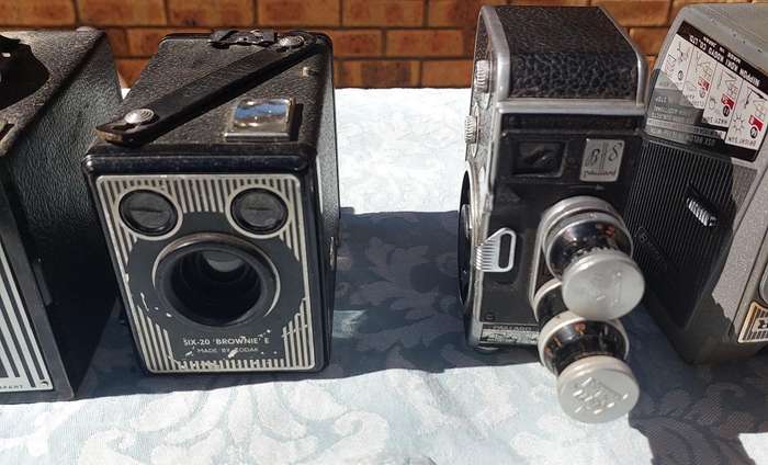 AN ANTIQUE COLLECTION CAMERAS SOLD AS IS