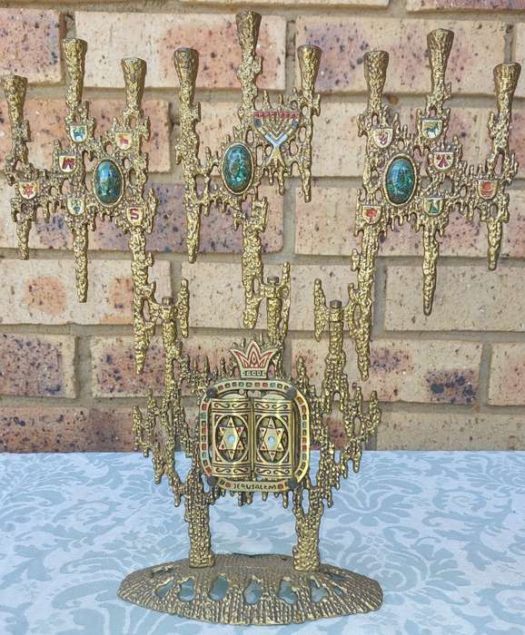A VINTAGE BRUTALIST BRASS SWIVEL ARMS HANUKKAH MENORAH WAINBERG ISRAEL 13 X 12 INCHES SOLD