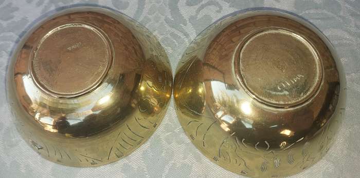 TWO ART DECOR BRASS PEANUT BOWLS SOLD AS IS R150