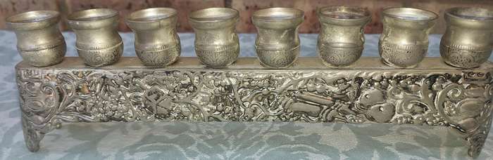A VINTAGE ISRAEL JUDAICA MENORA SOLD AS IS