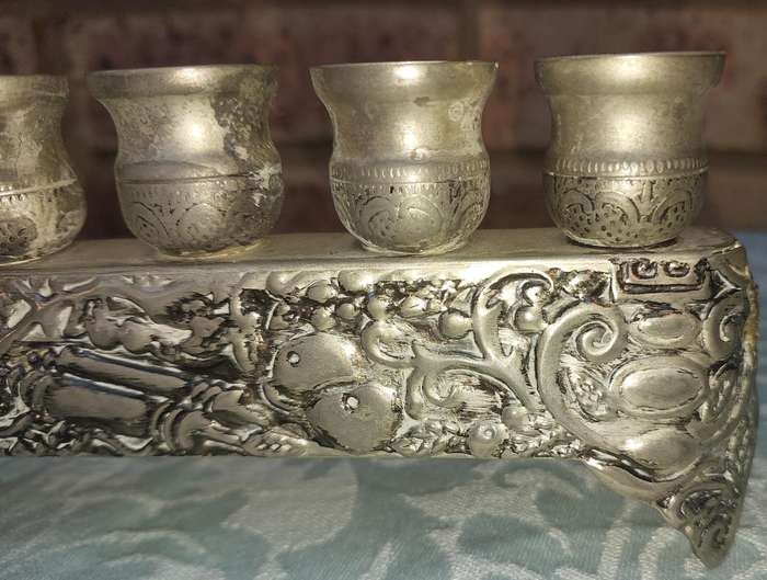 A VINTAGE ISRAEL JUDAICA MENORA SOLD AS IS