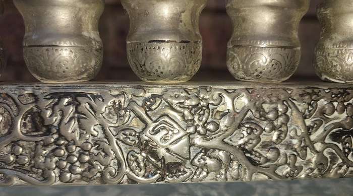 A VINTAGE ISRAEL JUDAICA MENORA SOLD AS IS