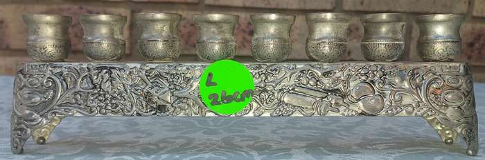 A VINTAGE ISRAEL JUDAICA MENORA SOLD AS IS