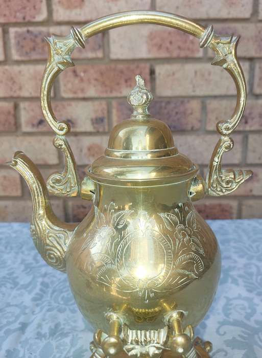 Vintage Brass and Silver Plated Tipping Teapot sold as is