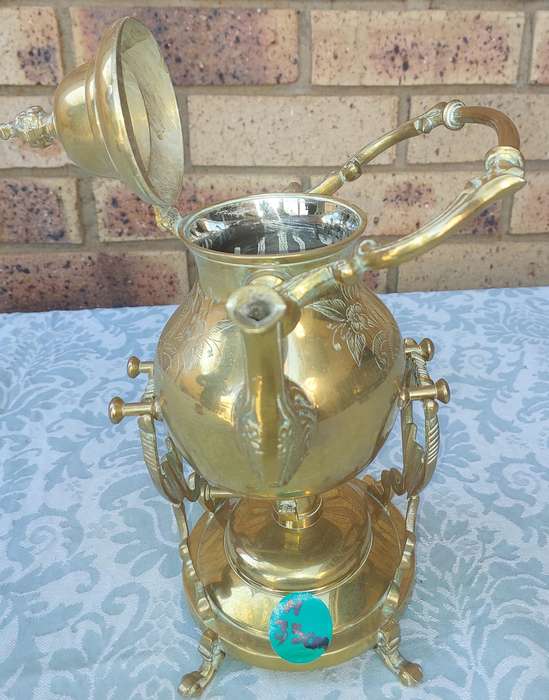 Vintage Brass and Silver Plated Tipping Teapot sold as is
